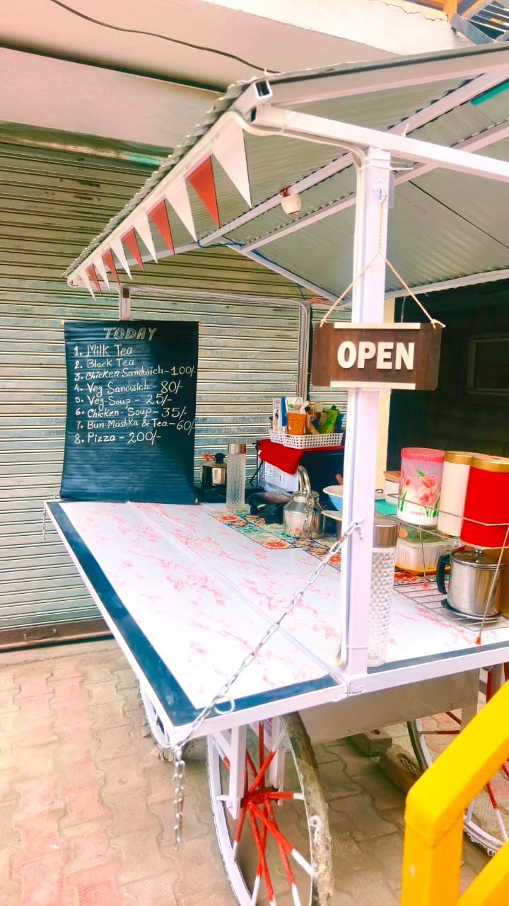 The in-house cafe cart at Dahar Retreat with its chalkboard menu