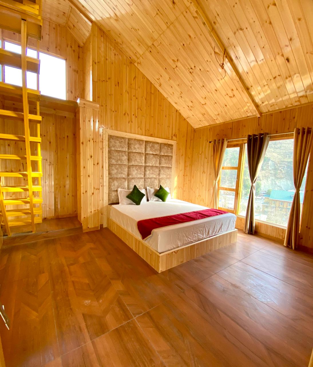Duplex Family Suite with yellow staircase to the loft bedroom